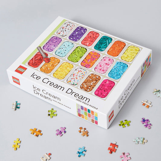 Product Image – LEGO® Ice Cream Dream 1000-Piece Puzzle on a table with a few puzzle pieces around it