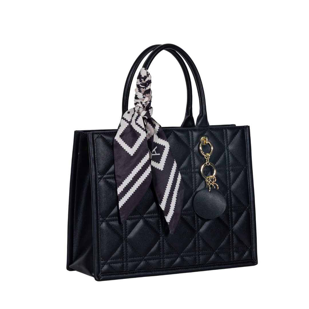 Sayan Sayan Top Zip Handbag Tote with two handles, geometric scarf, and a gold keychain accessory.