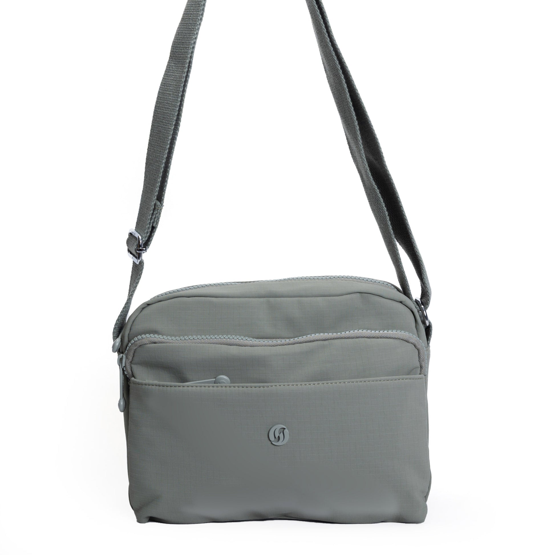 Miss Caprice Multi-zip Square Crossbody—sage with adjustable strap; perfect for everyday use.