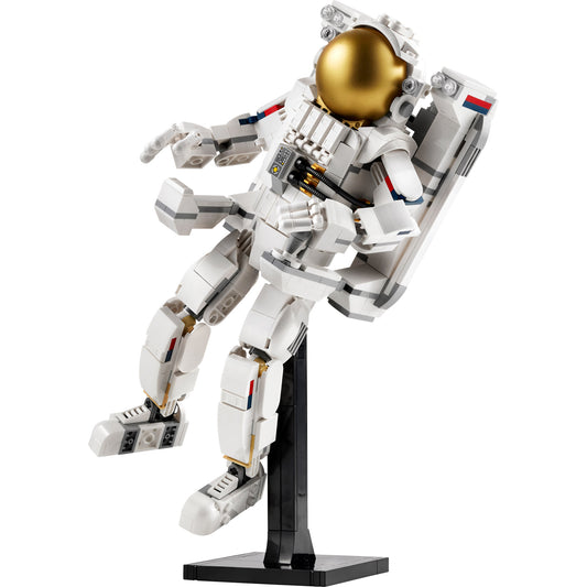 Product Image – A LEGO® Space Astronaut - ONLINE ONLY figure in a spacesuit stands on a black display stand.