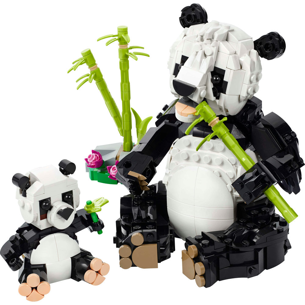 Two LEGO pandas play among bamboo and flowers in the LEGO® Wild Animals: Panda Family.