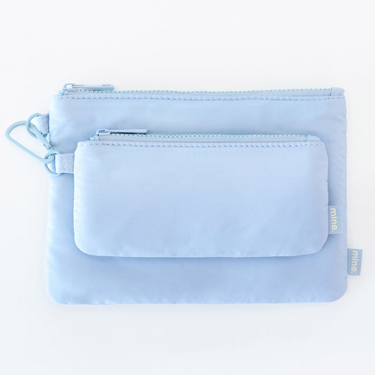 Product Image – Two MyTagAlongs Organization Pouches in light sky blue, perfect for travel accessories or cosmetics.