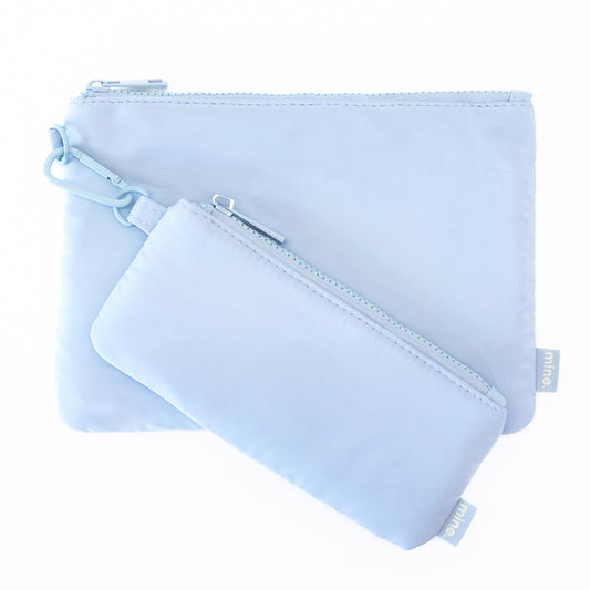 Product Image – Two light sky blue MyTagAlongs Organization Pouches with zippers and clip, perfect for cosmetics or organizing.