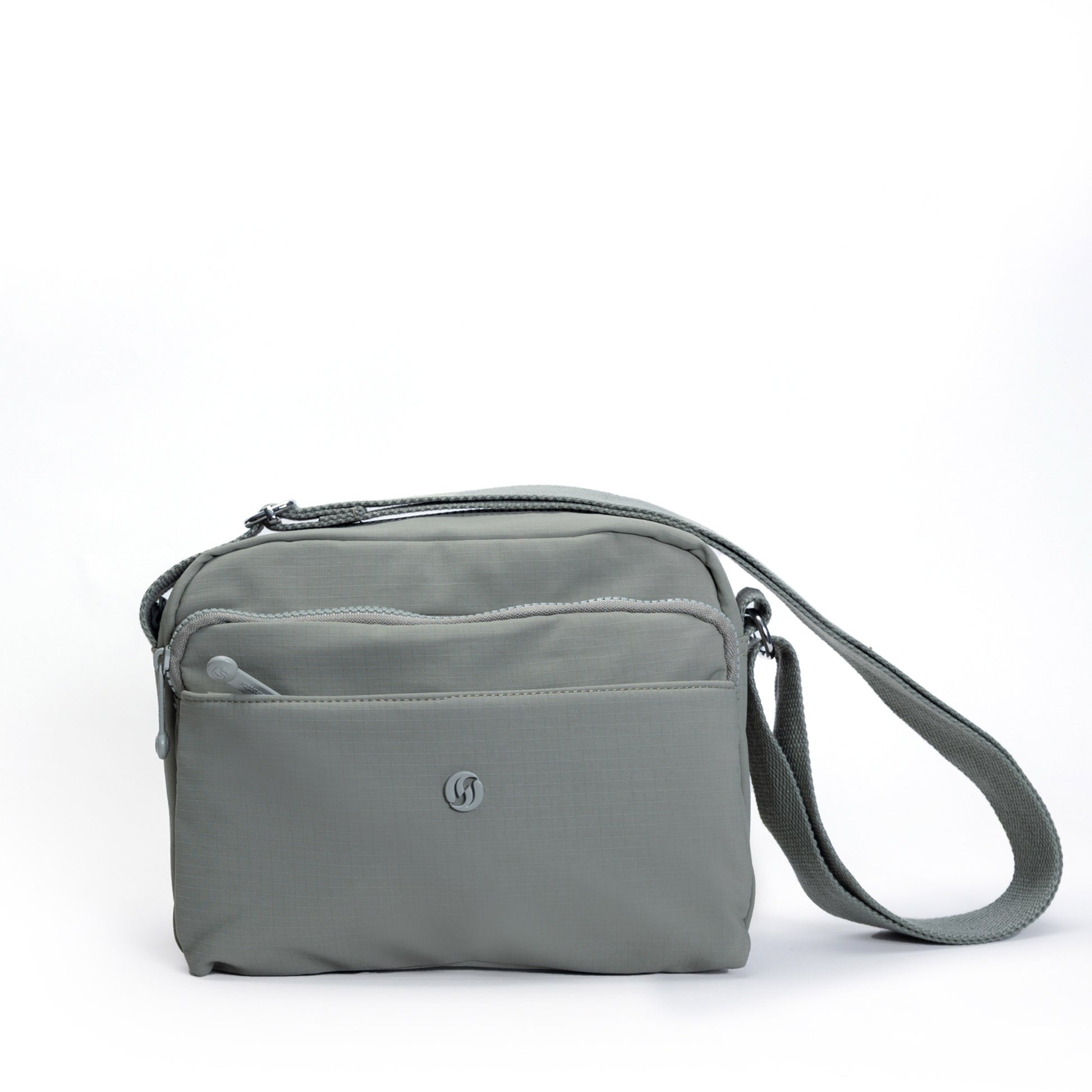 The Miss Caprice Multi-zip Square Crossbody is a gray bag with multiple zippered compartments for daily use.