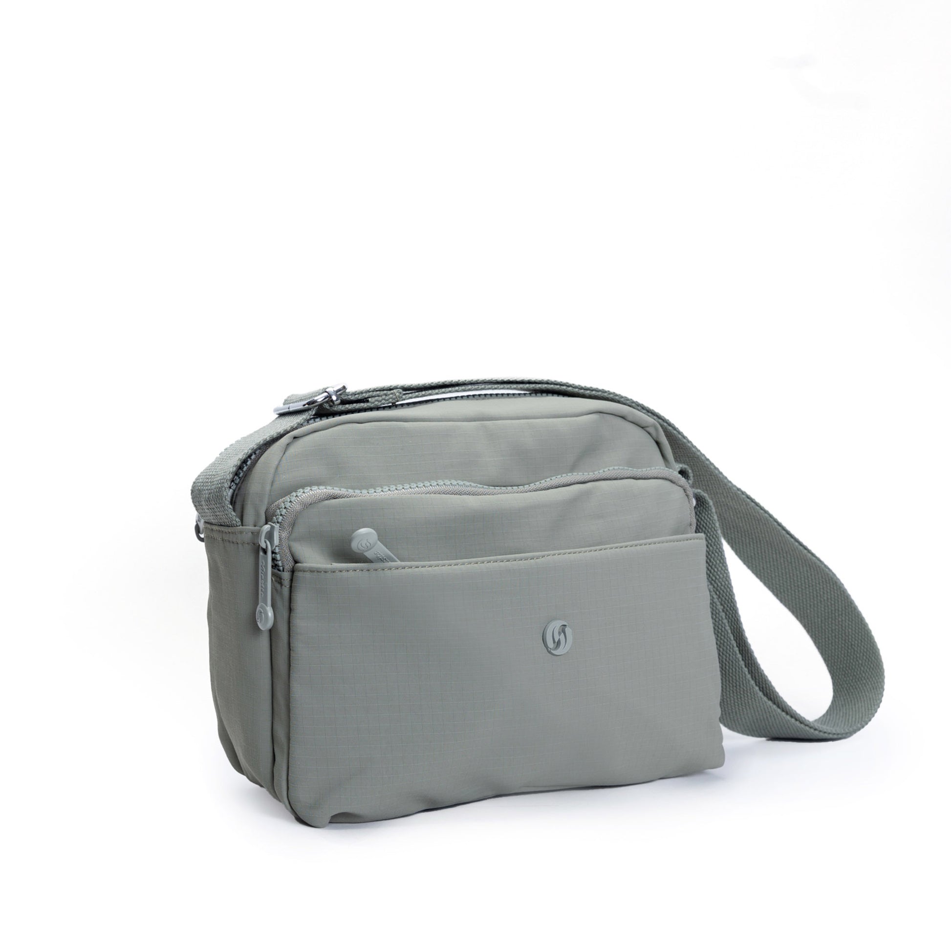 Miss Caprice Multi-zip Square Crossbody in sage with zip pockets and adjustable strap for daily use.