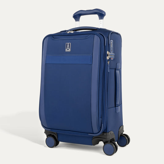 Product Image – Travelpro VersaPack+ blue carry-on spinner with 4 wheels, TSA lock, and retractable handle on white background.