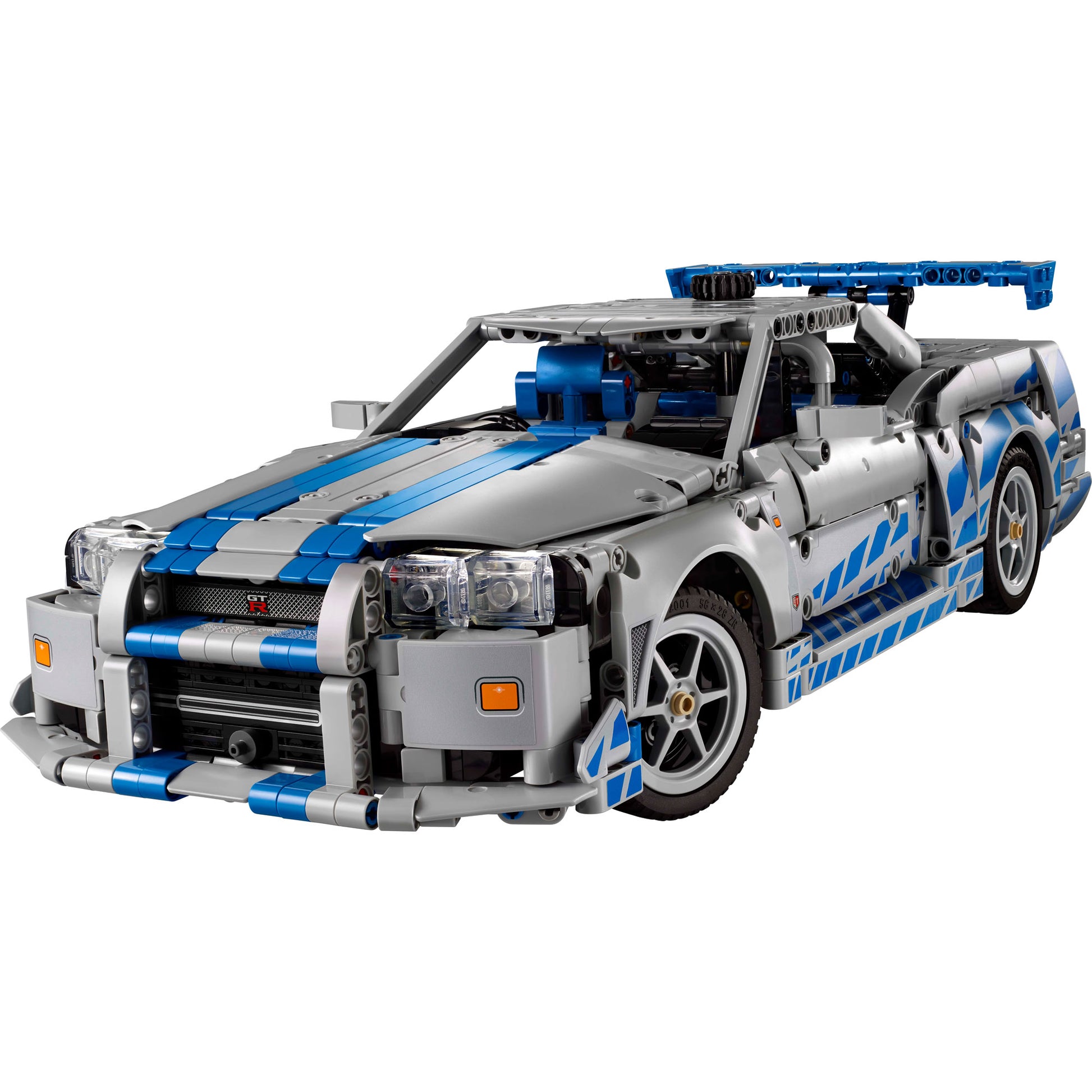 A gray and blue LEGO® 2 Fast 2 Furious Nissan Skyline GT-R (R34) car, viewed from the front left side.