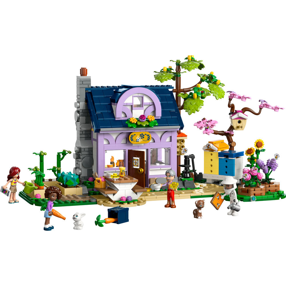 LEGO® Beekeepers' House and Flower Garden set with figures, animals, plants, and accessories.