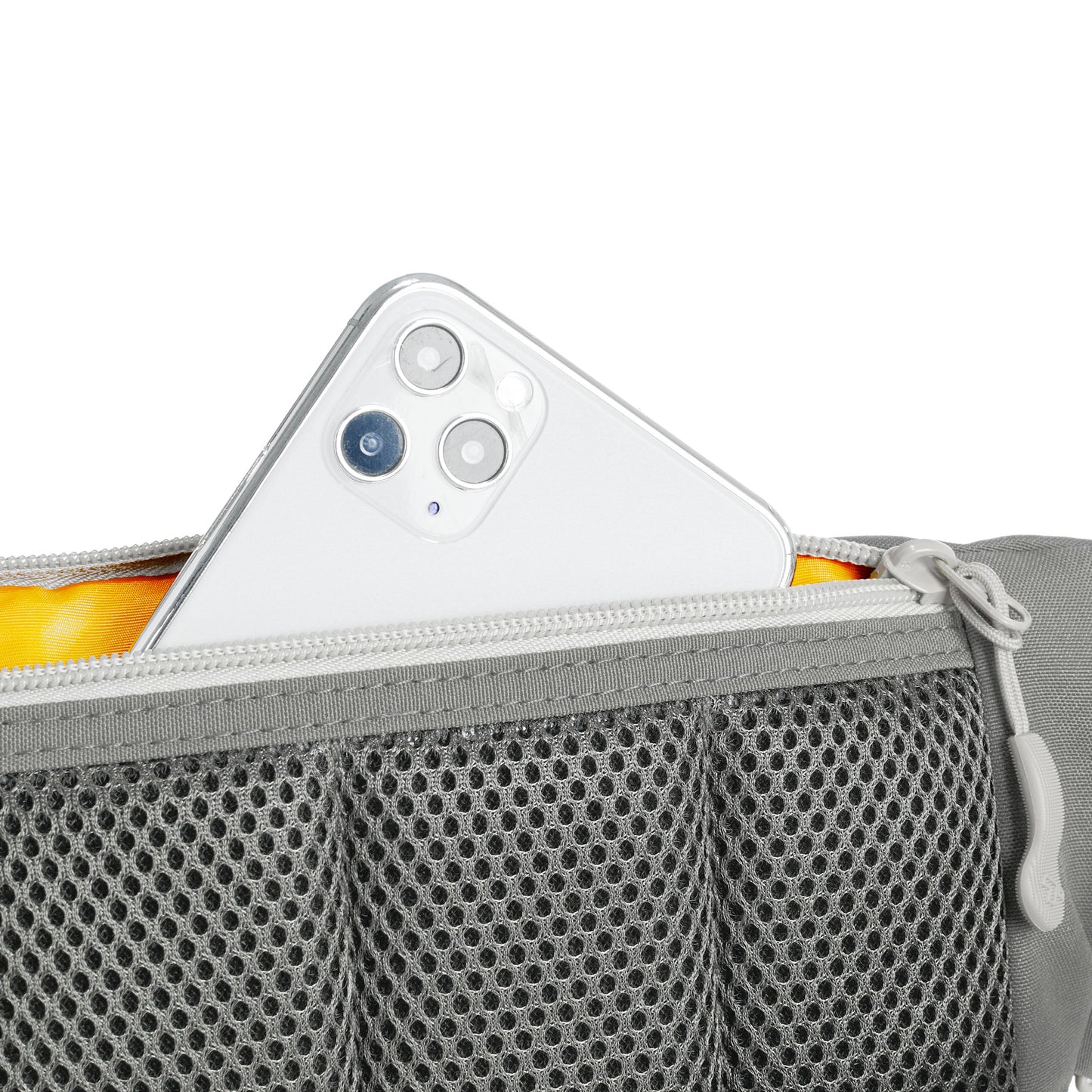 Smartphone in the gray mesh pocket of a Travelon Voyages Anti-Theft Waist Pack.