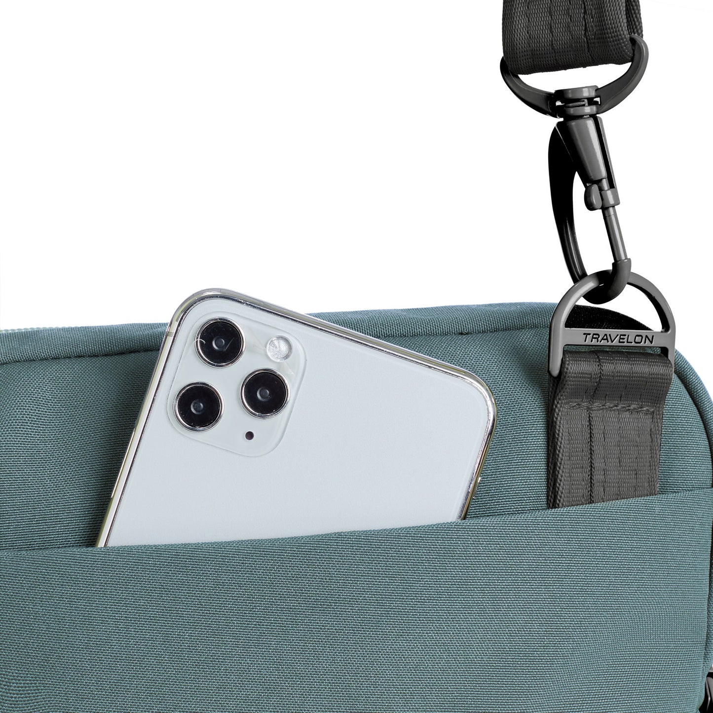 A smartphone peeks from the back pocket of Travelon's Anti-Theft Slim Bag.