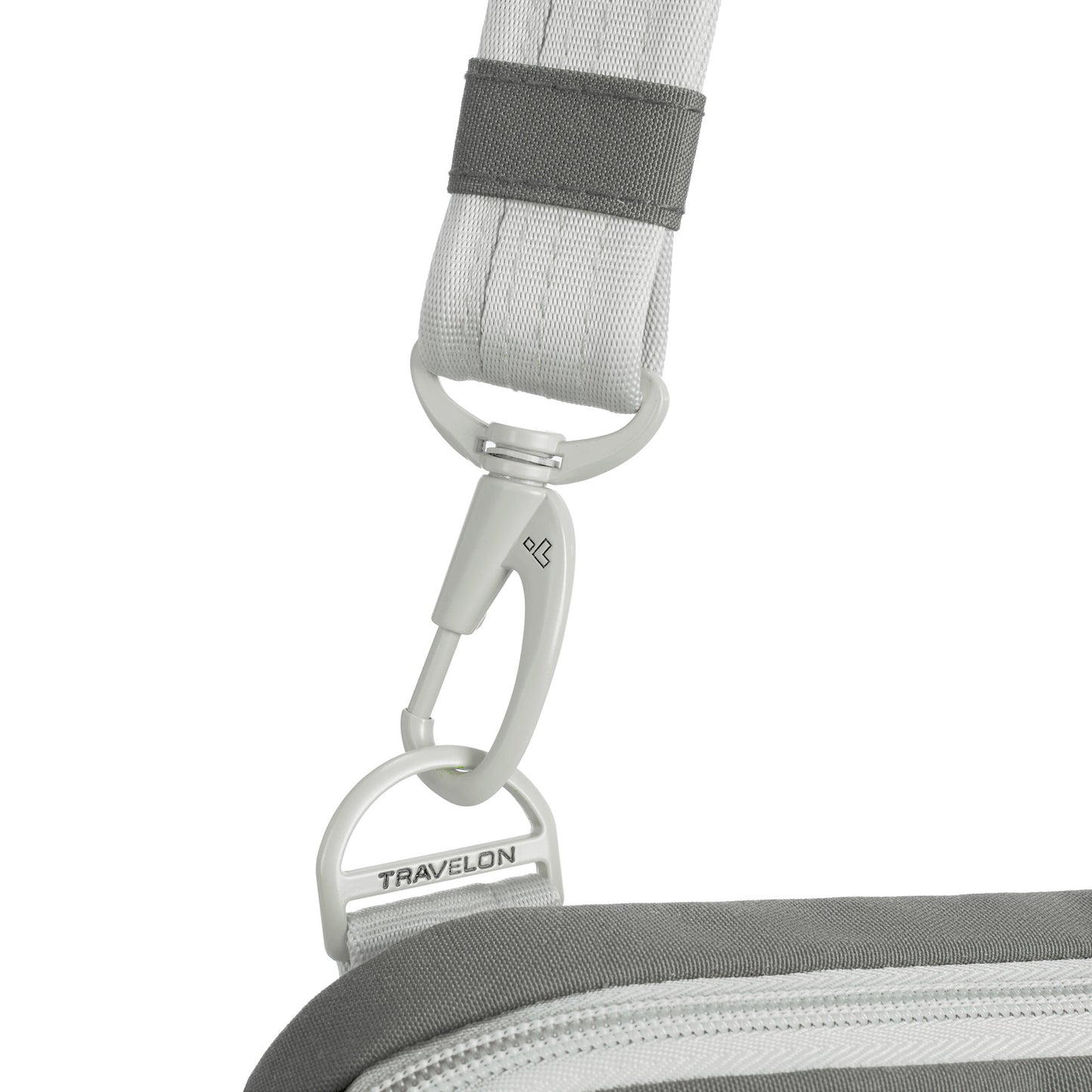 Close up of locking strap clip on the granite Travelon Voyages Anti-Theft Slim Bag.