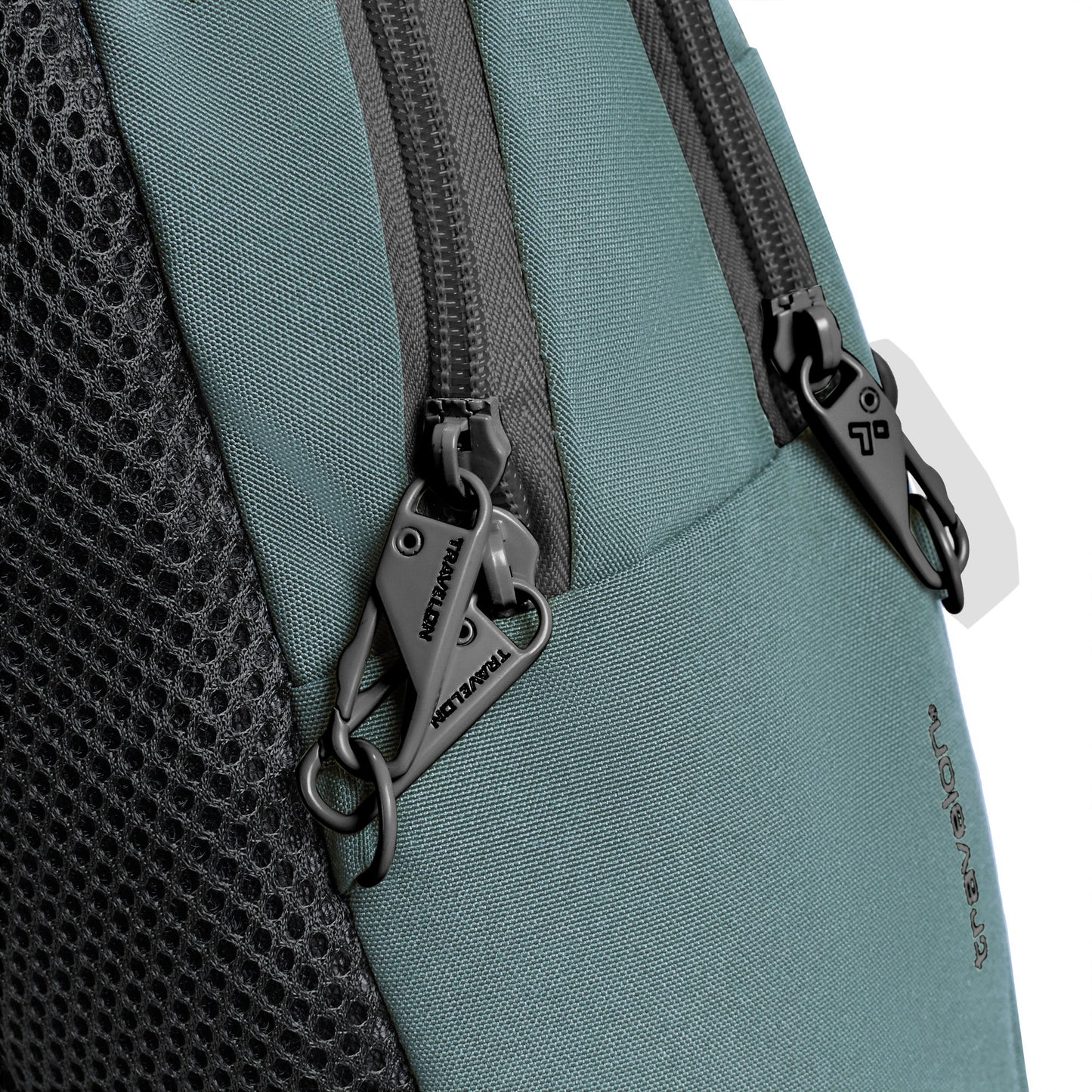 Close-up of a slate blue Travelon Voyages Anti-Theft Tour Bag with two lockable zippers.