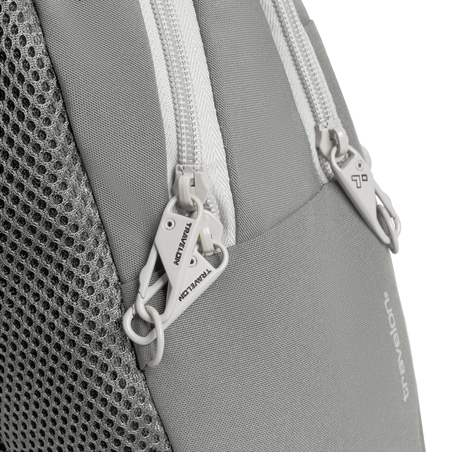 Travelon Voyages bag in gray with dual locking zippers, RFID blocking, and a mesh side pocket for anti-theft protection.