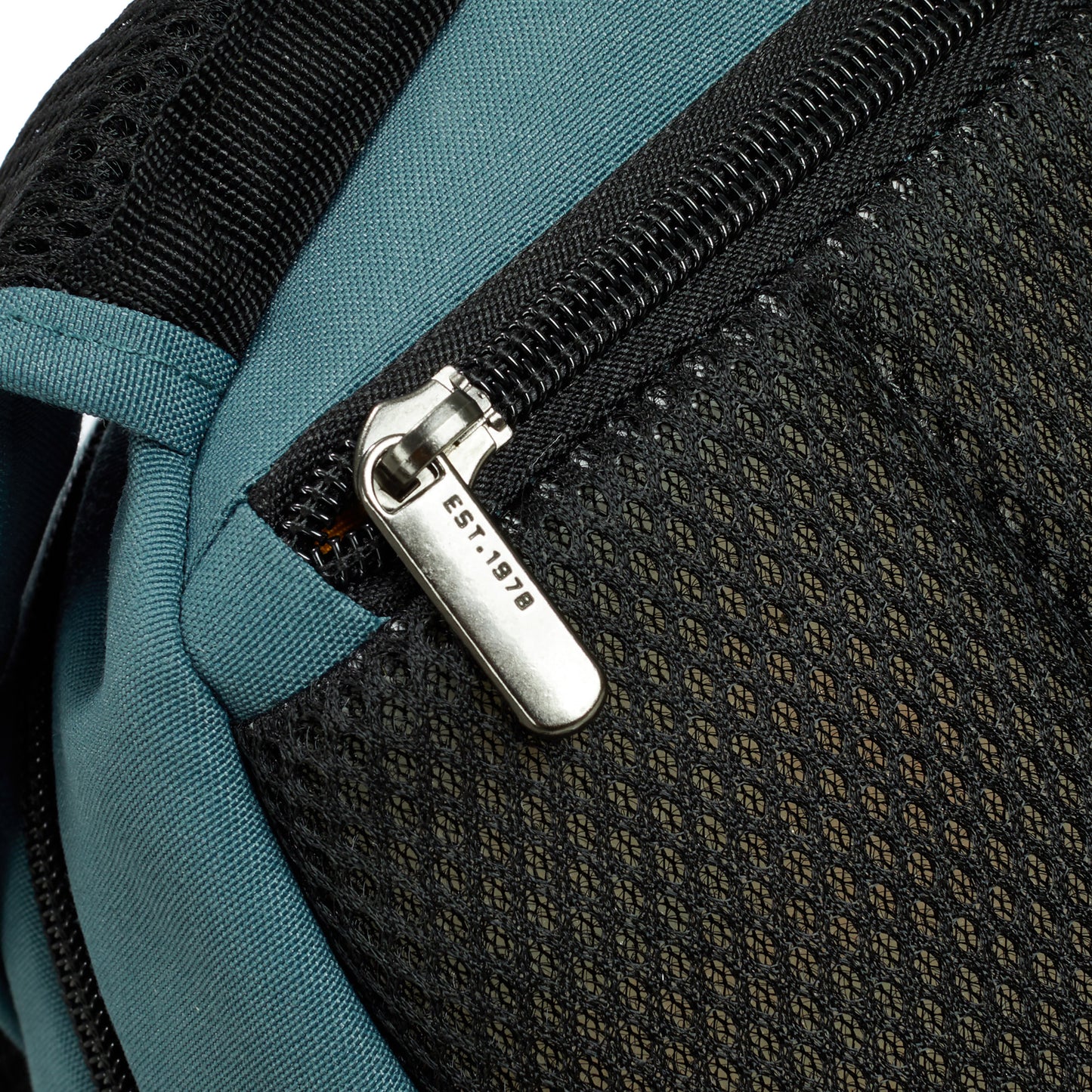 Close-up of back security pocket of the Travelon Voyages Anti-Theft Backpack.