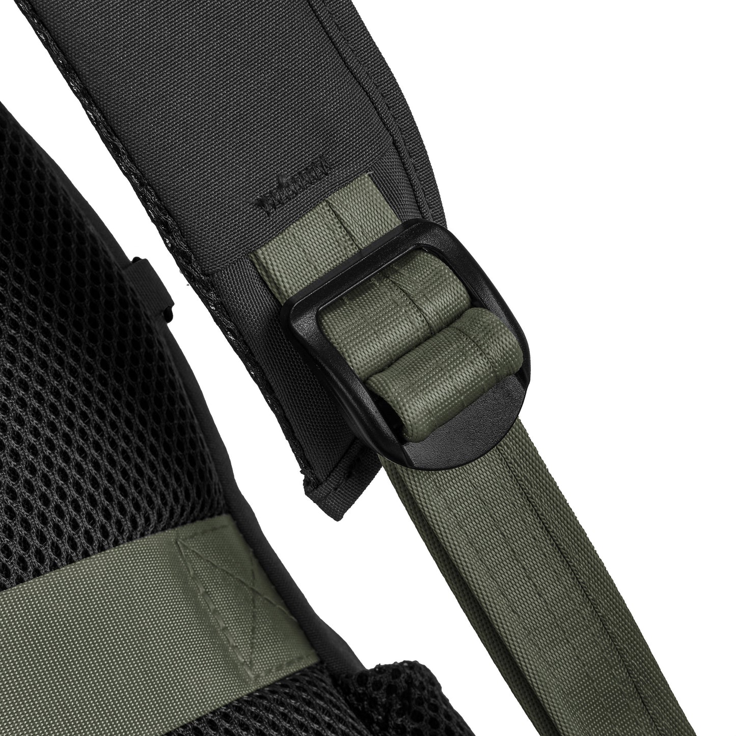 Close-up of the Travelon Voyages Anti-Theft Day Pack's black and green strap with buckle, mesh fabric, & slash-resistance.