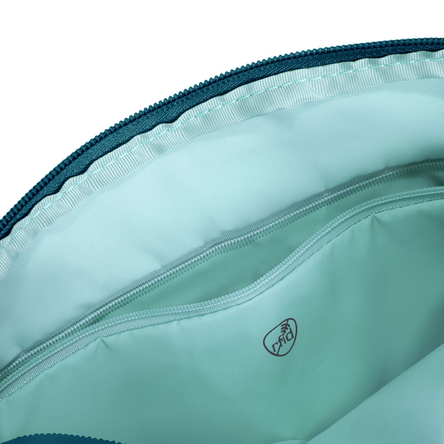 Open zippered pocket inside Travelon's lightweight nylon bag, the Roam Anti-theft Crossbody.