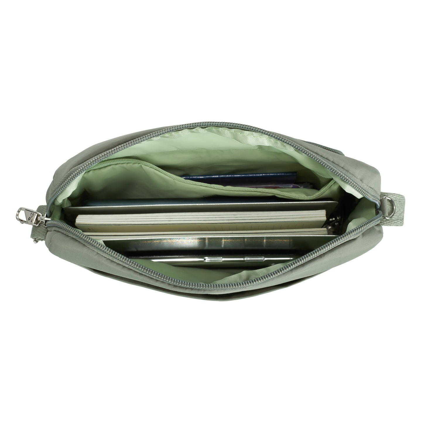 Inside view of moss Travelon Roam Anti-theft East/West Crossbody with books and phone inside.