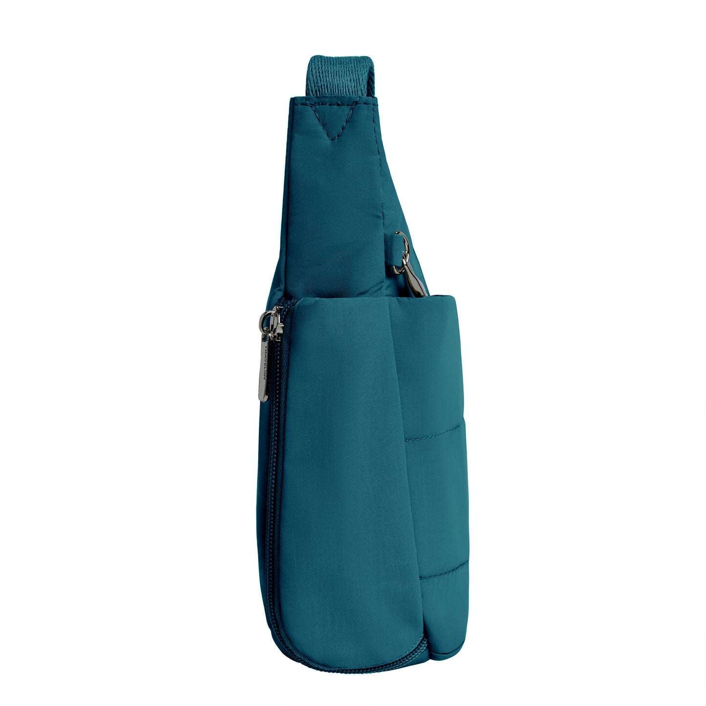 Side view of capri blue Travelon Roam Anti-theft crossbody bag in nylon with multiple pockets and silver zippers.