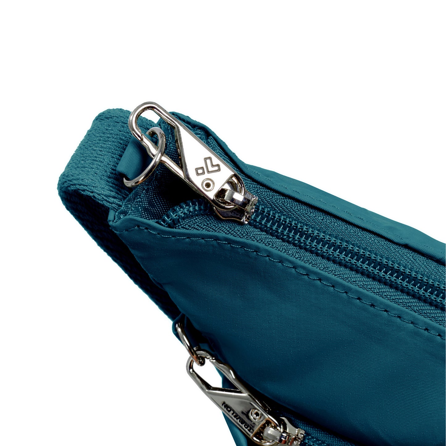 Close-up of Travelon Roam Anti-theft Medium Crossbody: capri blue nylon with silver zipper and security clasp.