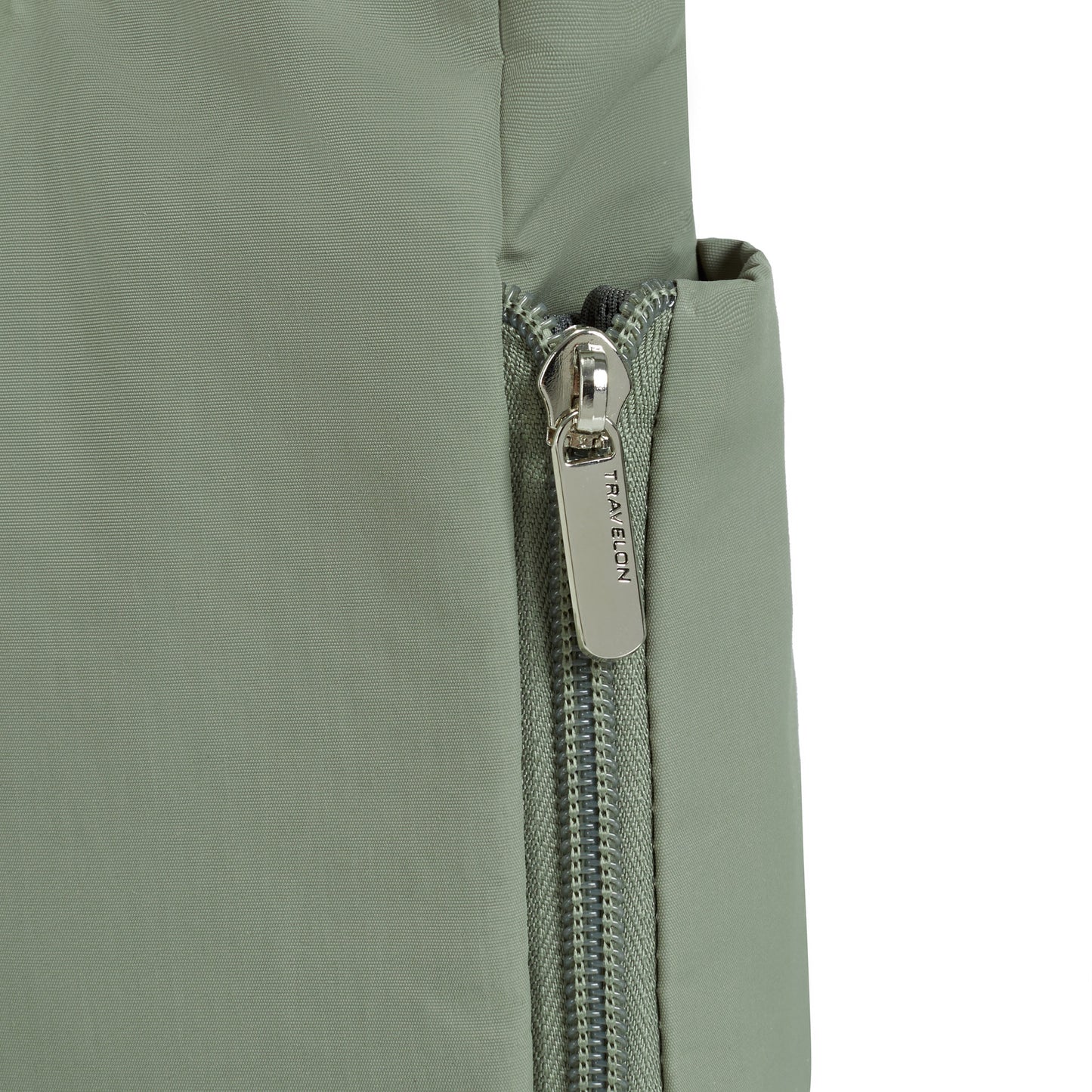 Travelon's Roam Anti-theft Medium Crossbody: moss green nylon, silver zipper, lightweight fabric bag.