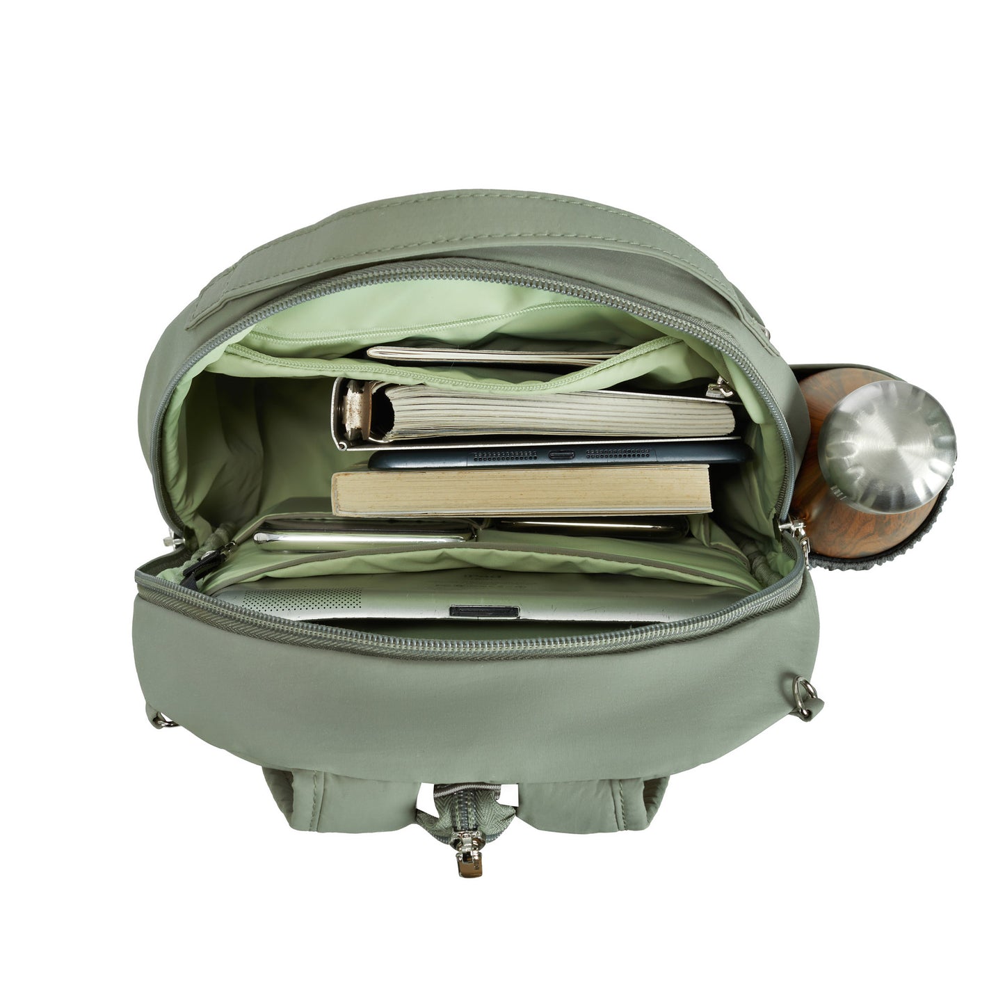 Travelon Roam Anti-theft Backpack with notebooks, a tablet, and a stainless steel bottle inside.