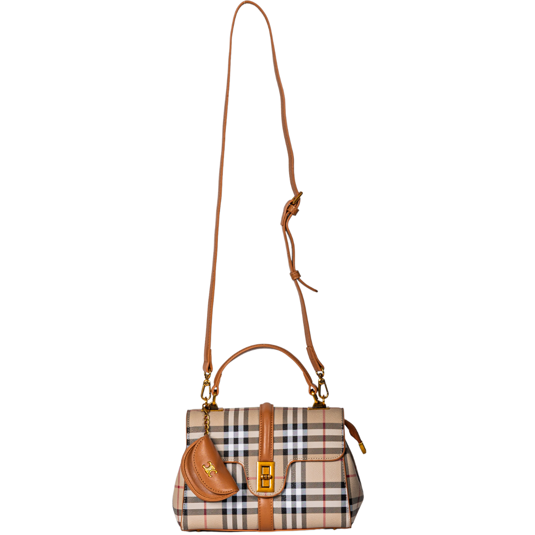 Miss Caprice Brianne bag with tan accents, gold hardware, adjustable strap, and small pouch.