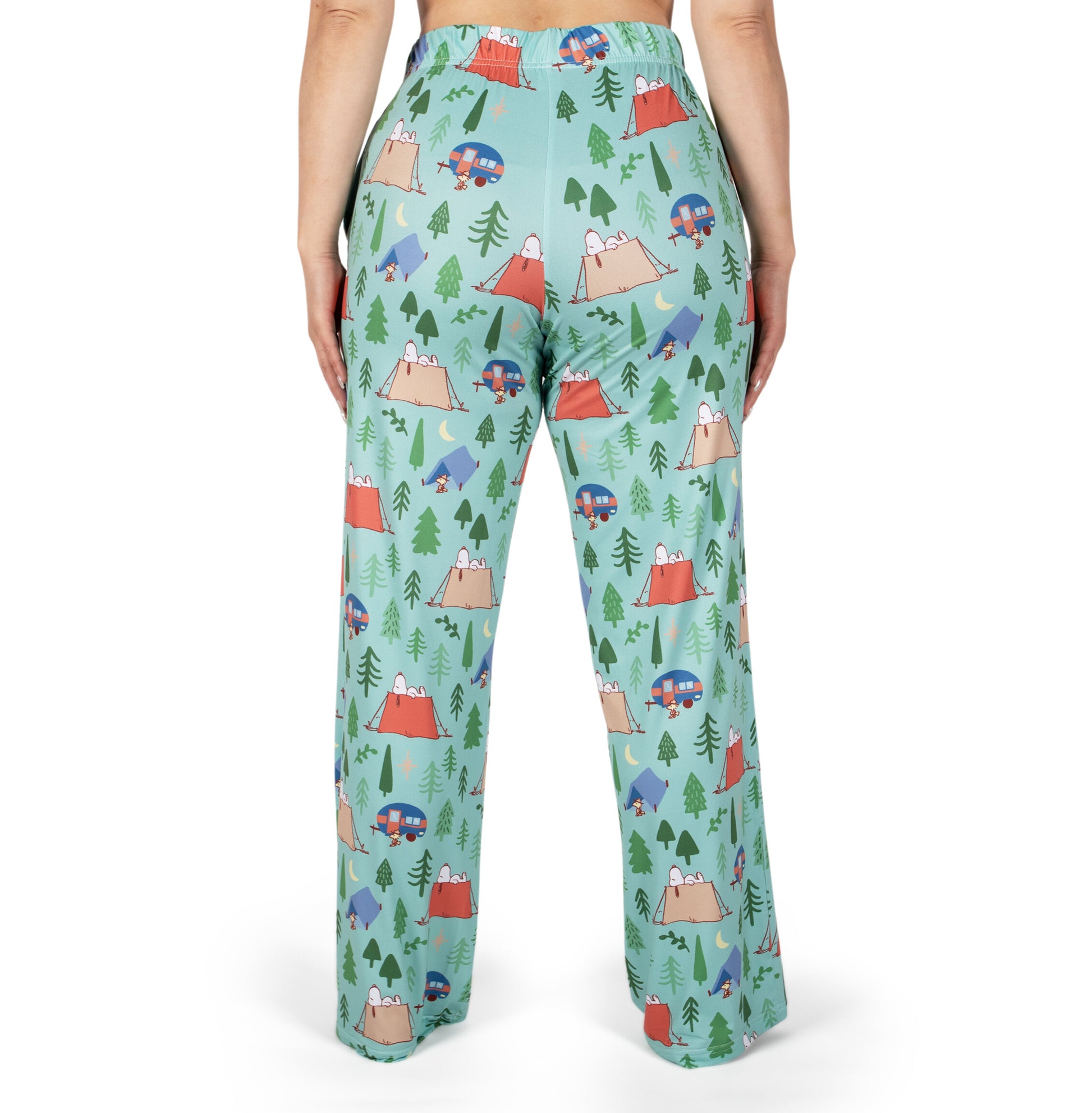 Person shown from the back wearing Brief Insanity Lounge Pants - Peanuts Snoopy Camping by Brief Insanity.