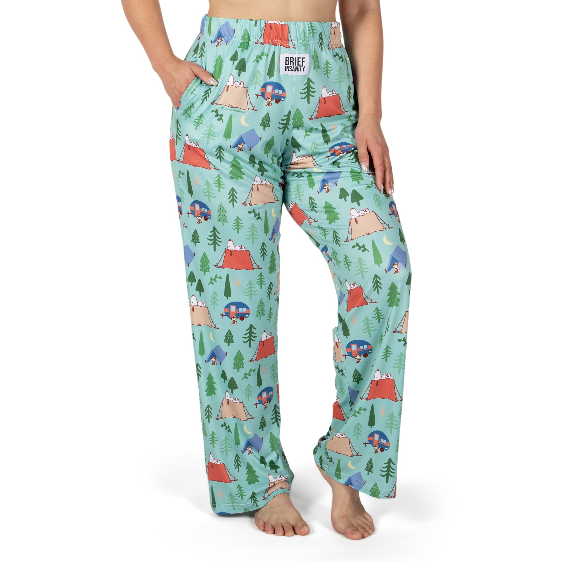 Person wearing Brief Insanity Lounge Pants - Peanuts Snoopy Camping by Brief Insanity.