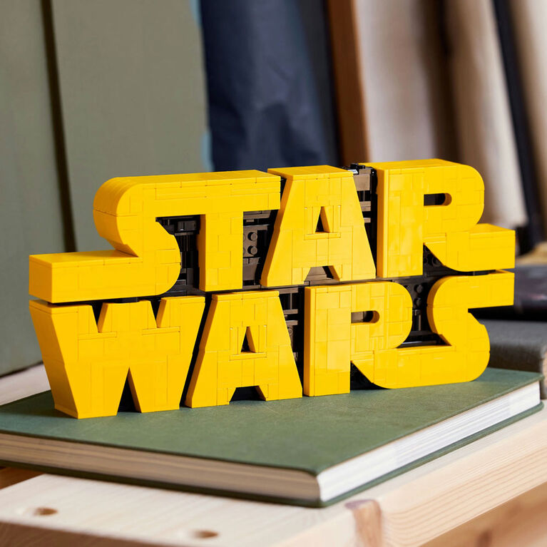 LEGO® Brick-Built Star Wars™ Logo displays yellow bricks atop a closed book.