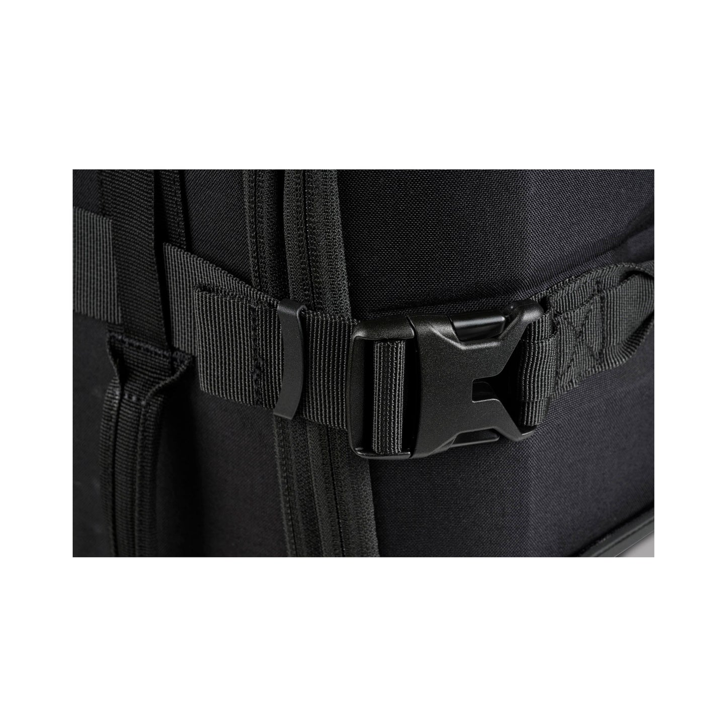 Pelican™ Aegis Carry-on 4-Wheel Hybrid Duffel, black, close up of wrap around buckle strap.
