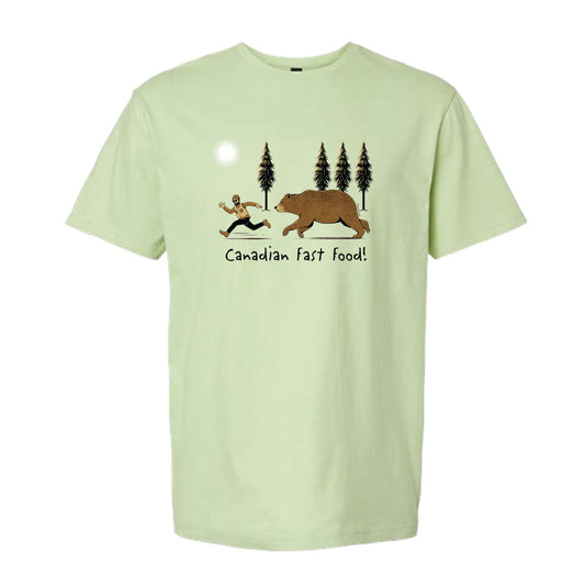 Product Image – Unisex Soft Style T-Shirt in pistachio colour with image of brown bear chasing a man with words Canadian Fast Food below