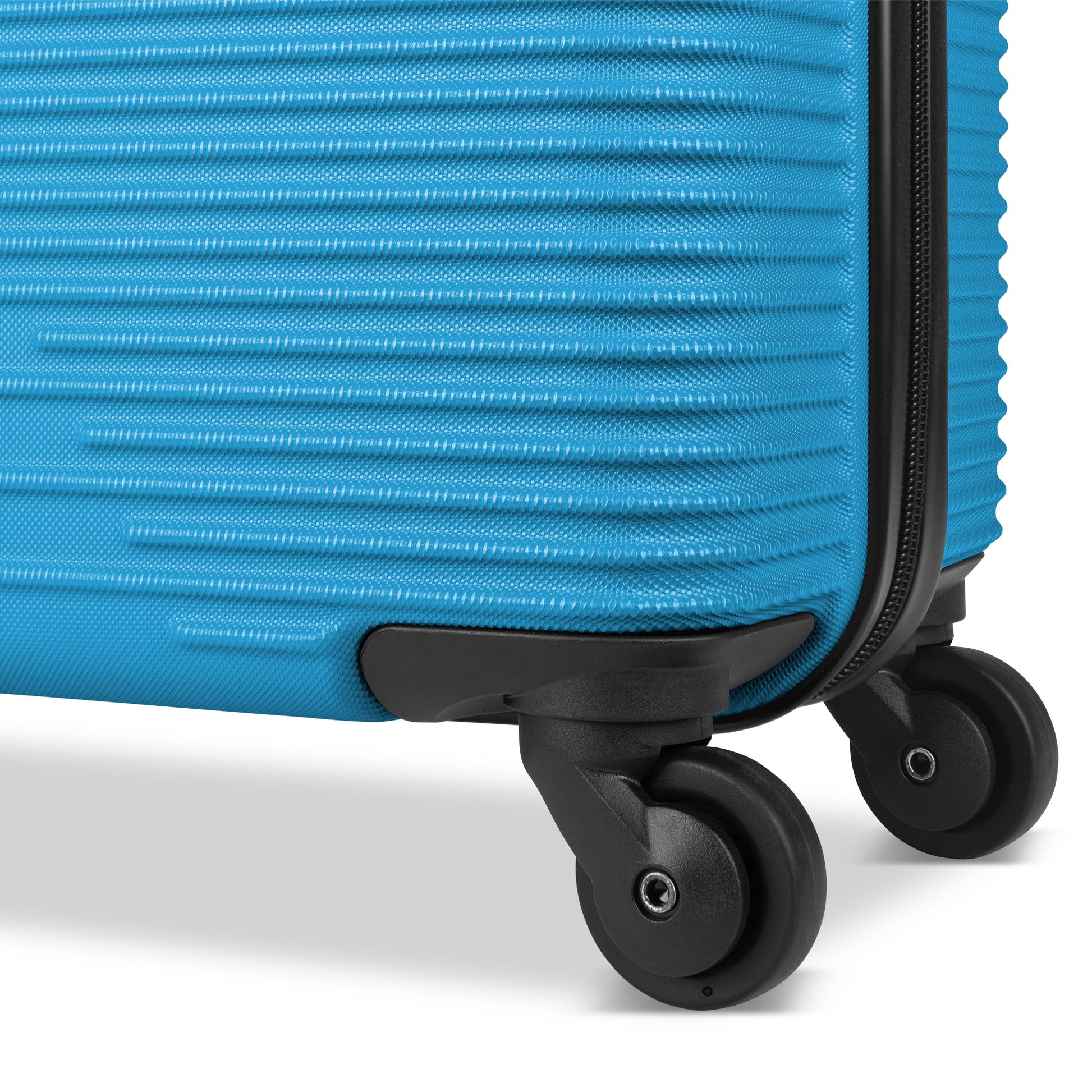 Close up of black spinner wheels on aquarius blue Atlantic Swerve 19" Hardside Spinner Carry-on