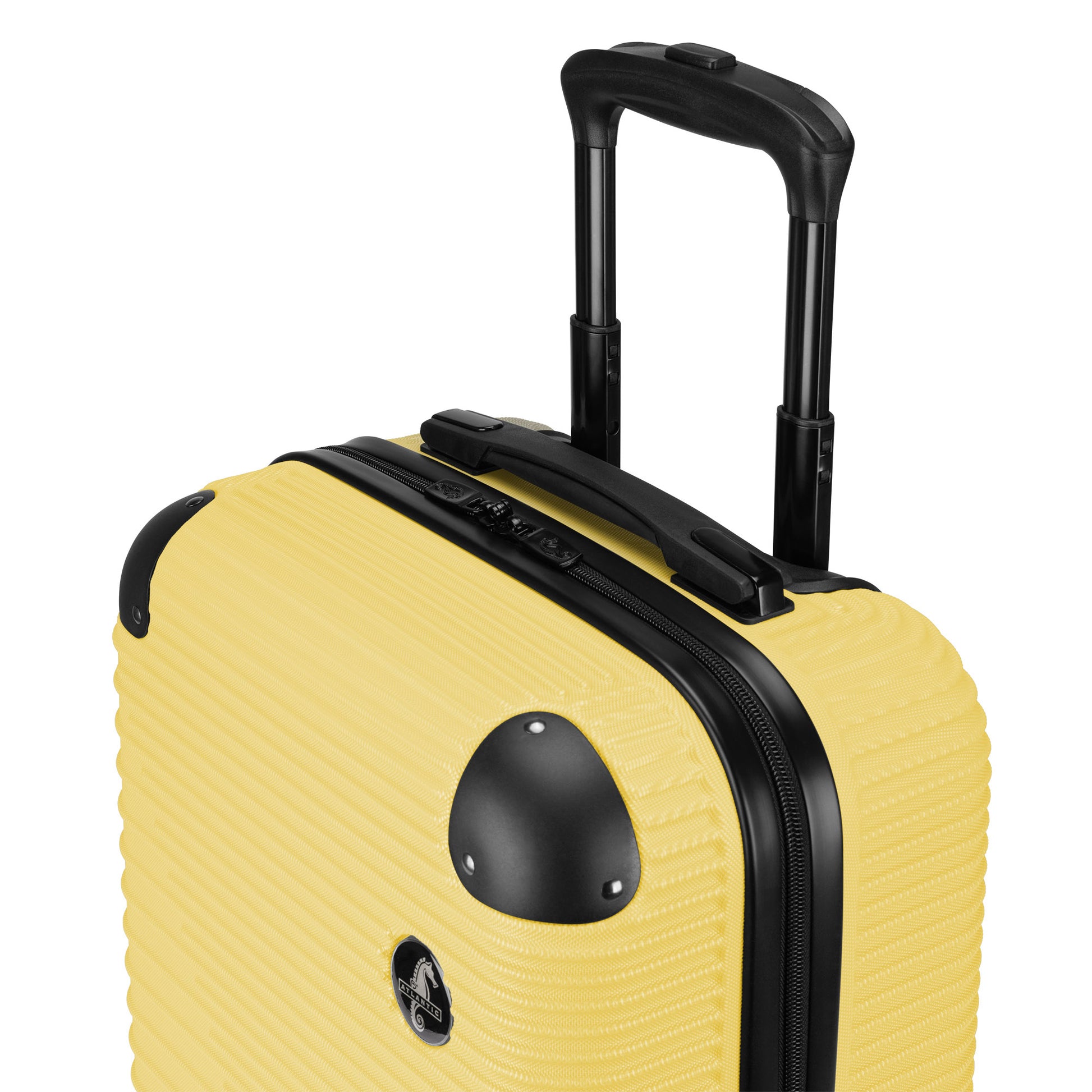 Atlantic Swerve 19" Hardside Spinner Carry-on, lemon meringue yellow, top angled view of black grab handle, zipper, corner bumpers, and telescopic handle, extended