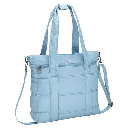 Product Image – Bench Georgia Satchel in light blue with quilted design, two handles, front zip pocket, and detachable strap.