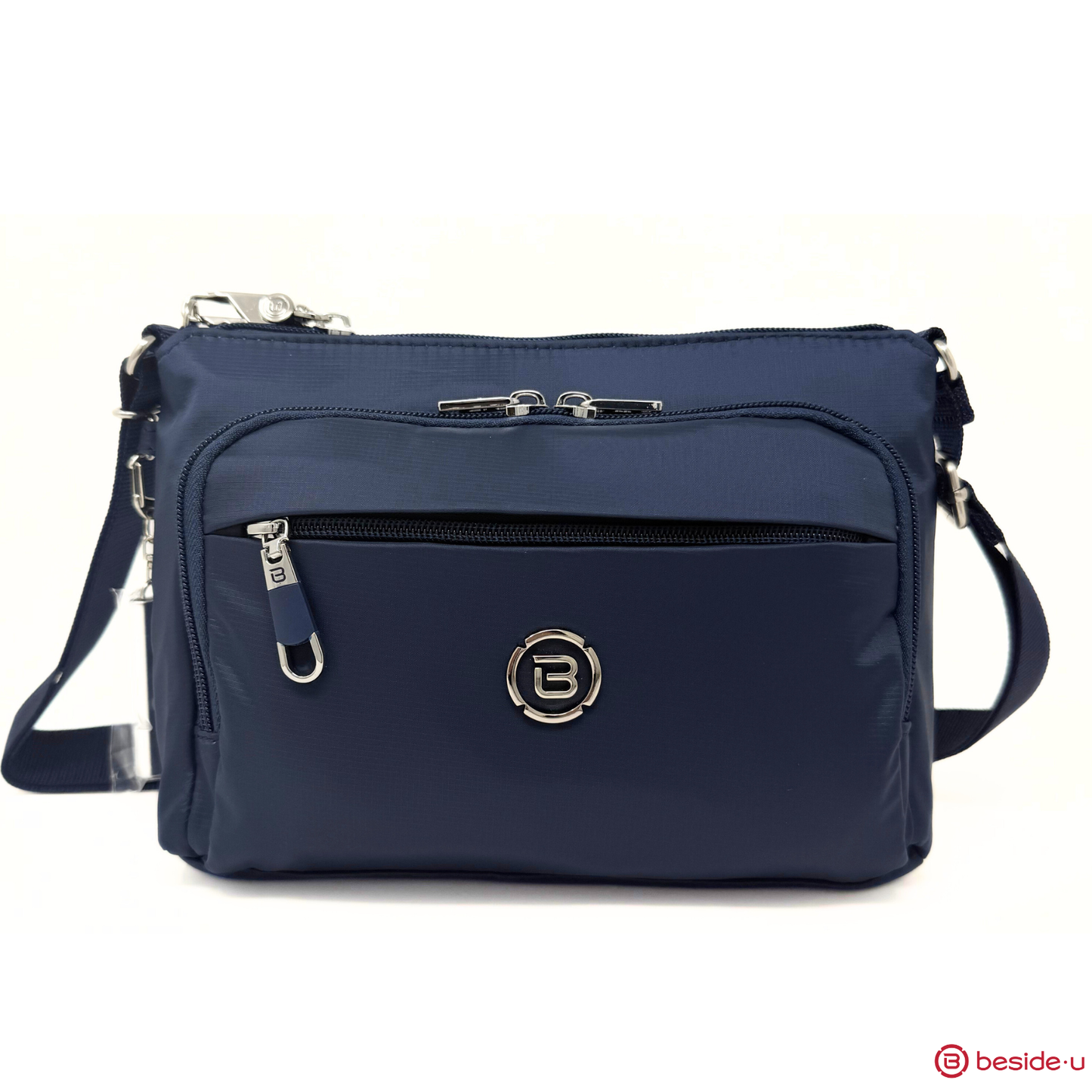 Beside-U Jubilee Crossbody in navy blue with RFID pocket, zip compartments, and silver hardware.