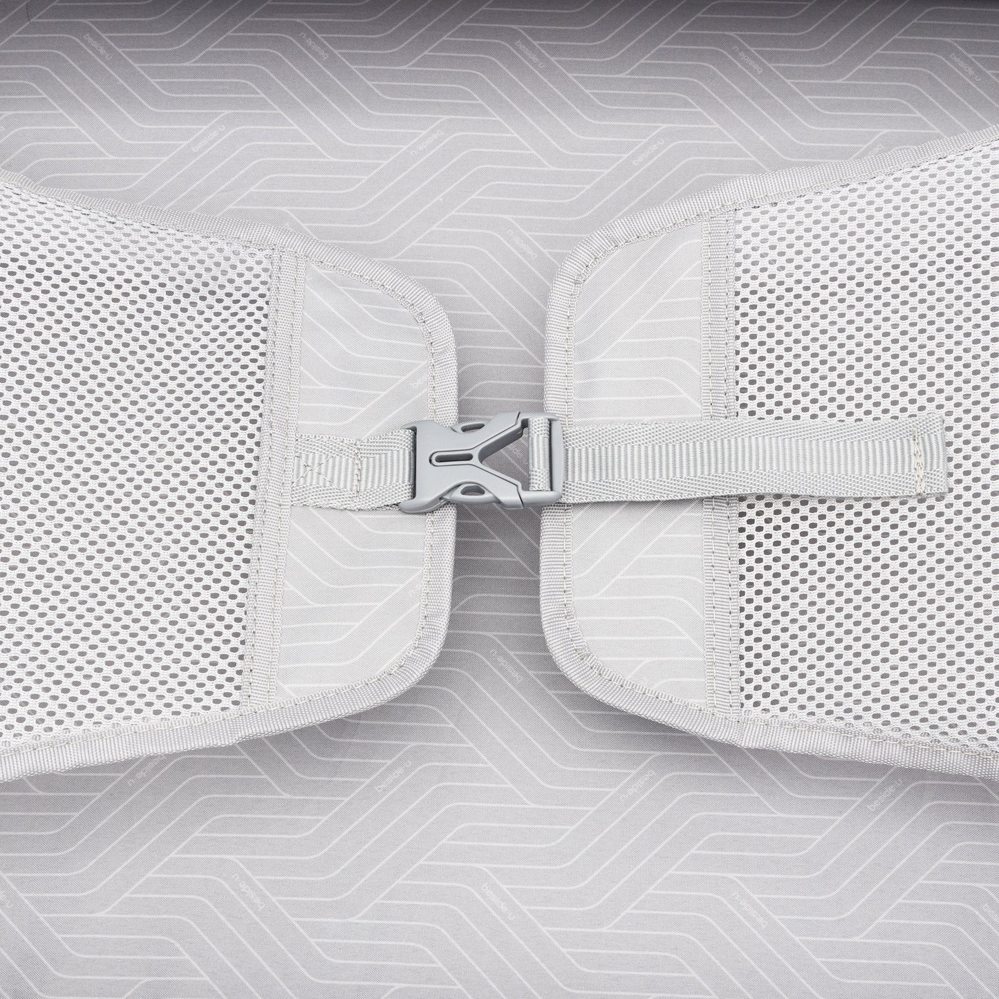 Close-up of a gray buckle on mesh straps, part of the Beside-U Posh Voyage 28" Hardside Spinner luggage.