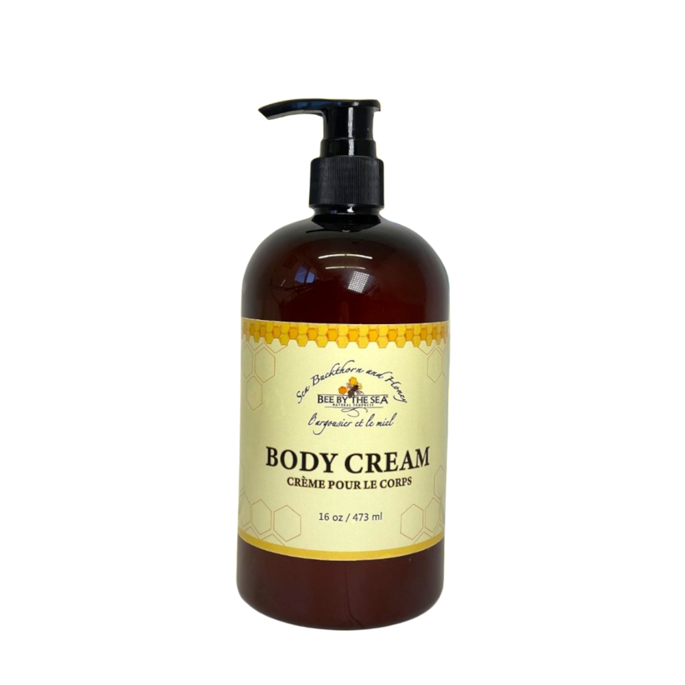 Dark amber coloured pump bottle with yellow body cream label, front view