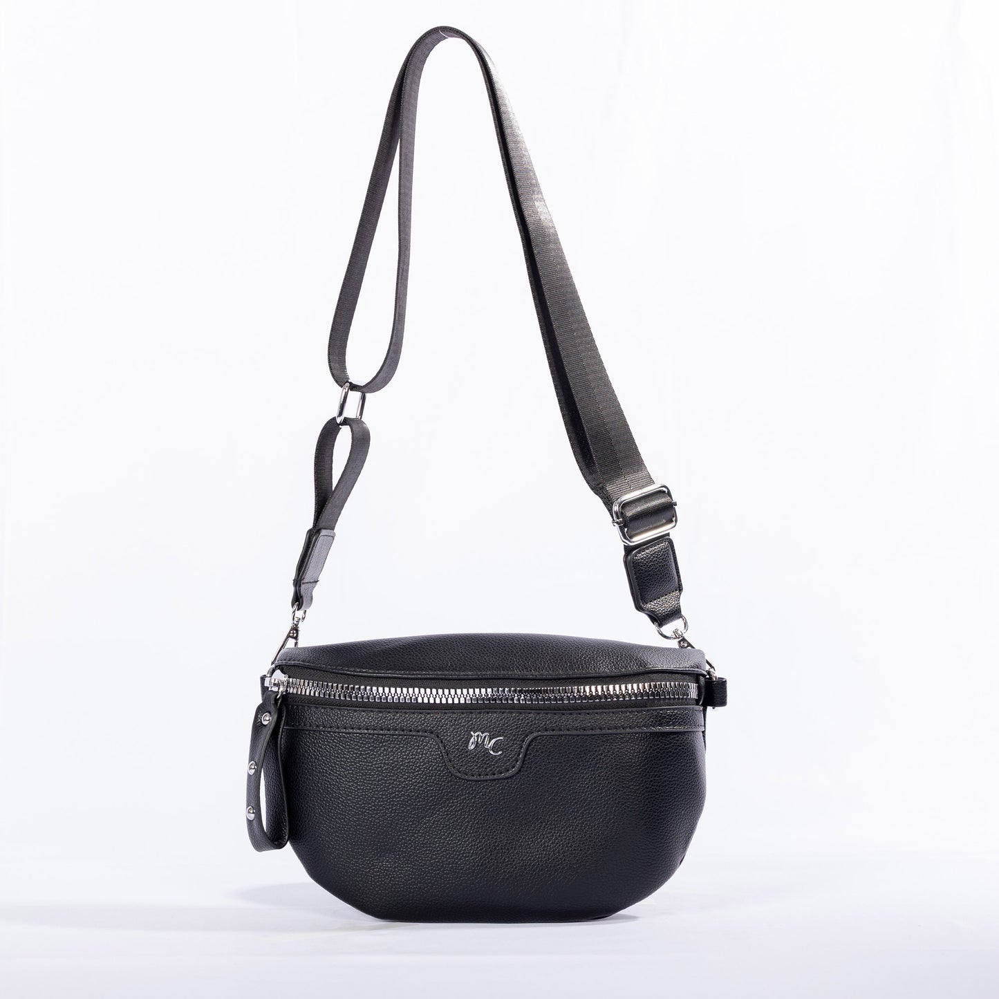 The Miss Caprice Waist/Crossbody Bag has a zip closure, silver hardware, and an adjustable nylon strap.