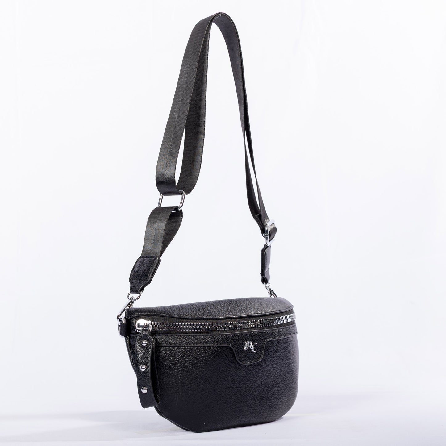 The Miss Caprice Waist/Crossbody Bag has a wide adjustable nylon strap and a front zipper pocket.