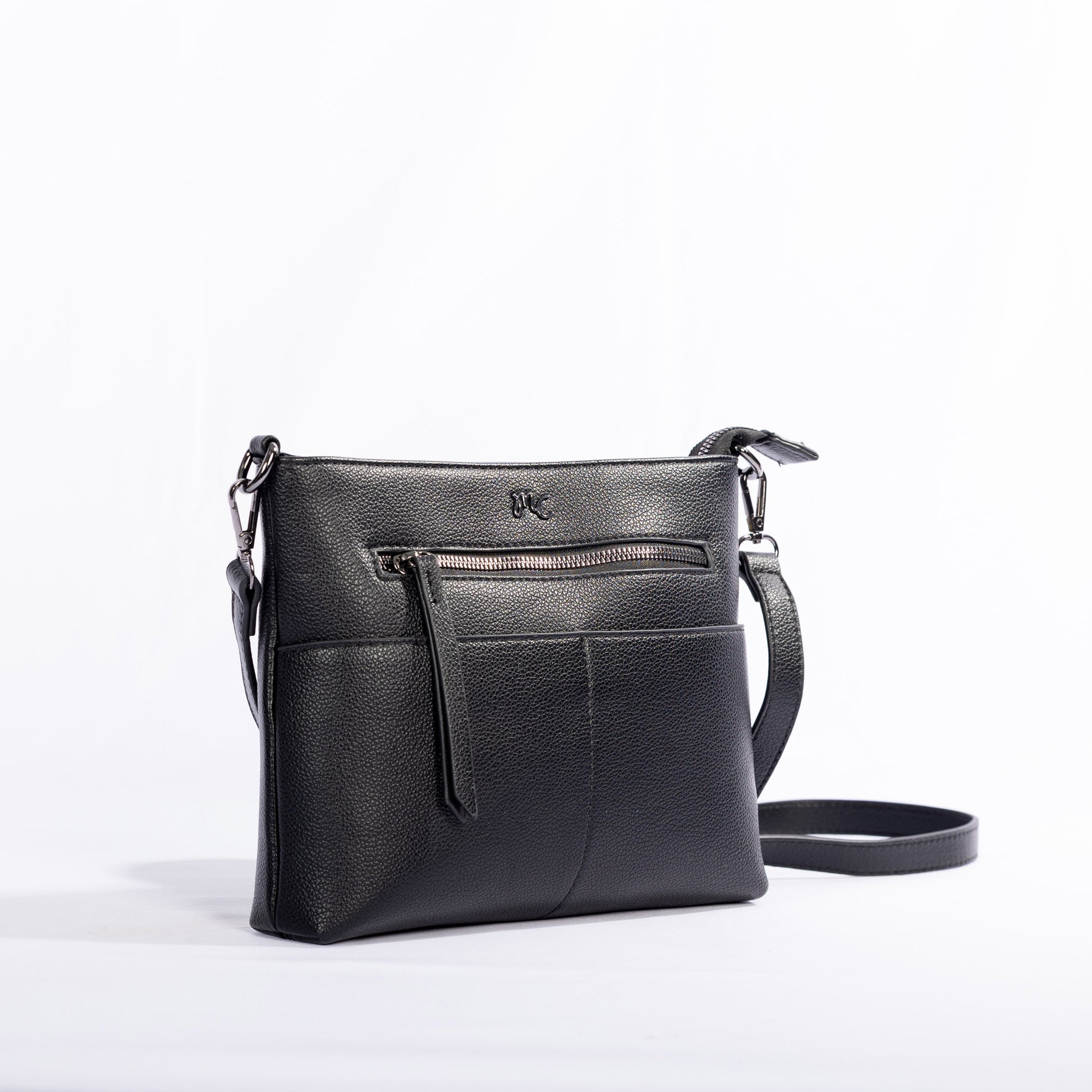 Miss Caprice Front Zipper Crossbody: black leather bag with front zipper pocket and adjustable strap.