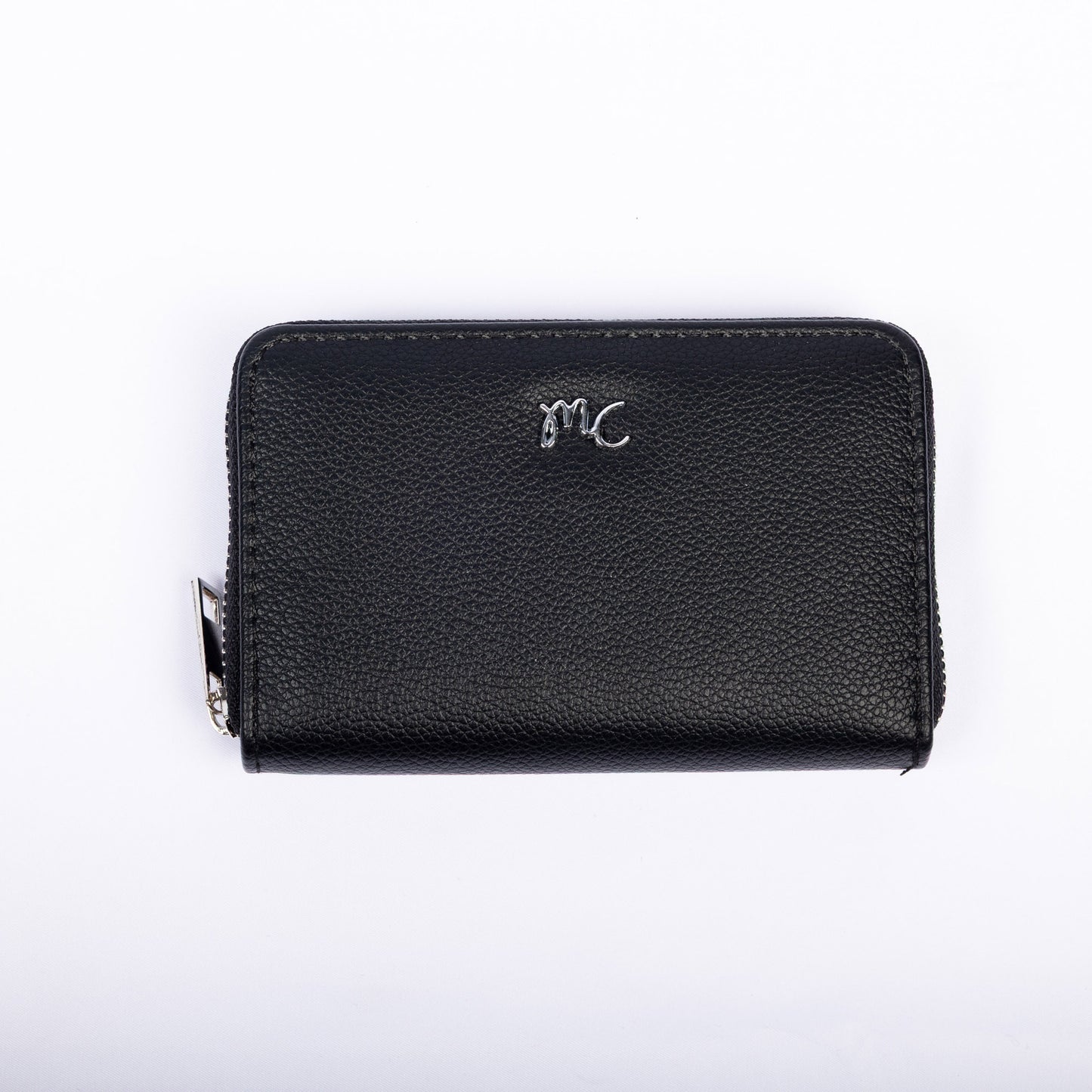 Miss Caprice Zip Around Wallet in black vegan leather with silver "MC" logo, shown on white background.