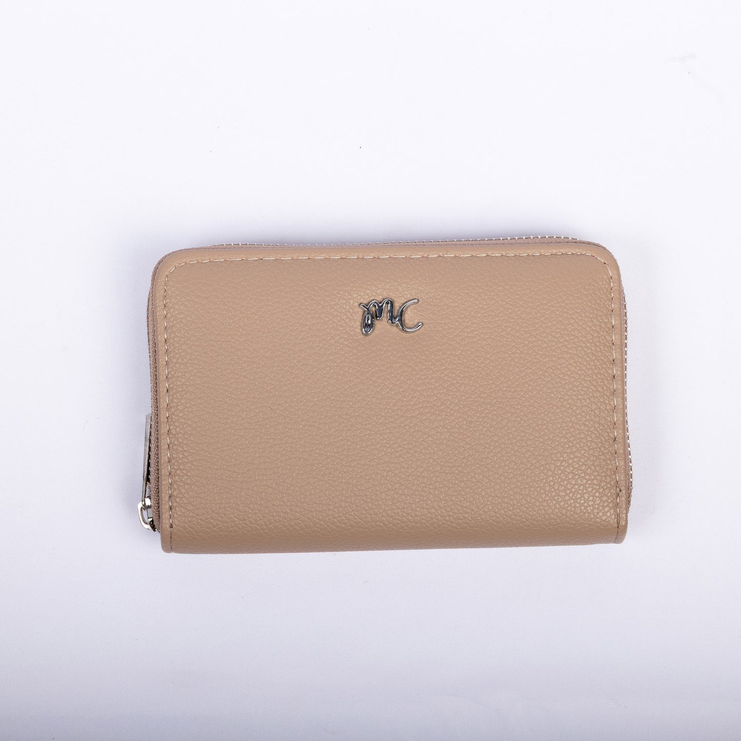 Miss Caprice Zip Around Wallet: beige vegan leather with silver zipper, metallic initials on white background.