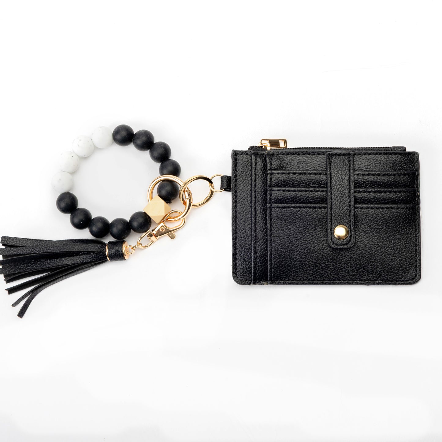 Miss Caprice Cardholder with bracelet keychain and gold zipper, in black faux leather with tassel detail.
