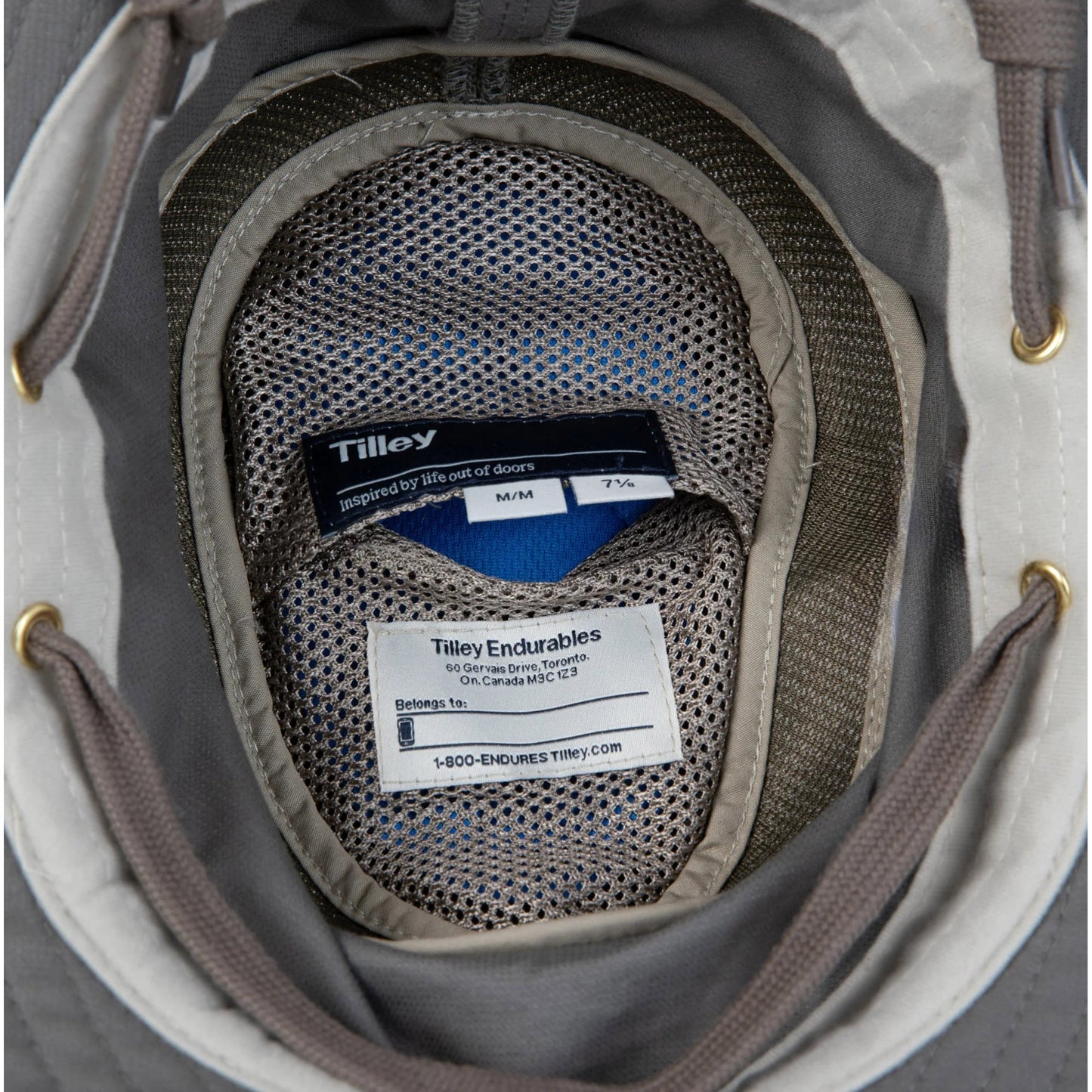 Close-up of underside of a Tilley hat with the HyperKewl™ Cooling Insert inside the mesh pocket.