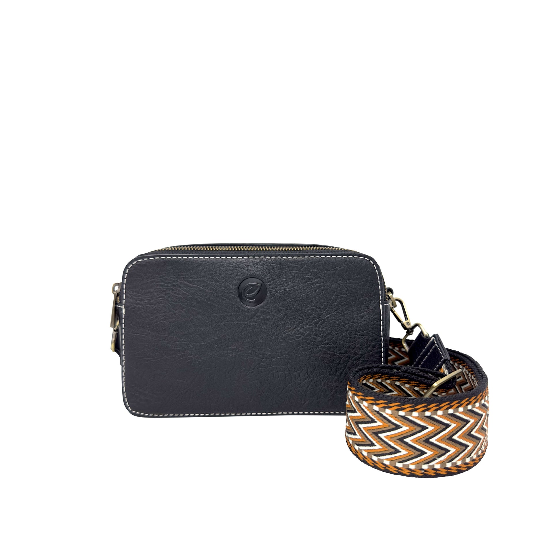 Espe Emerson Crossbody: black vegan bag with white stitching, zigzag strap, vintage camera bag style.