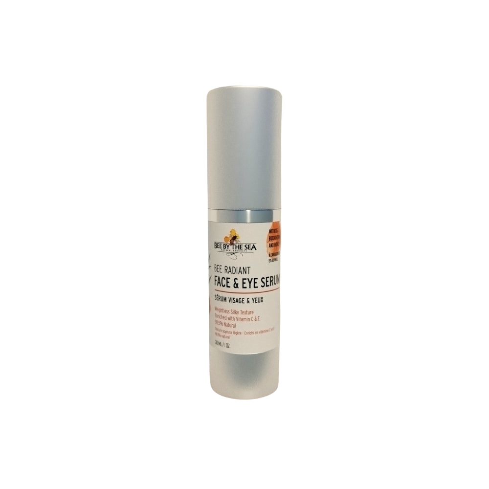 Silver pump bottle with lid and white face serum label, front view.