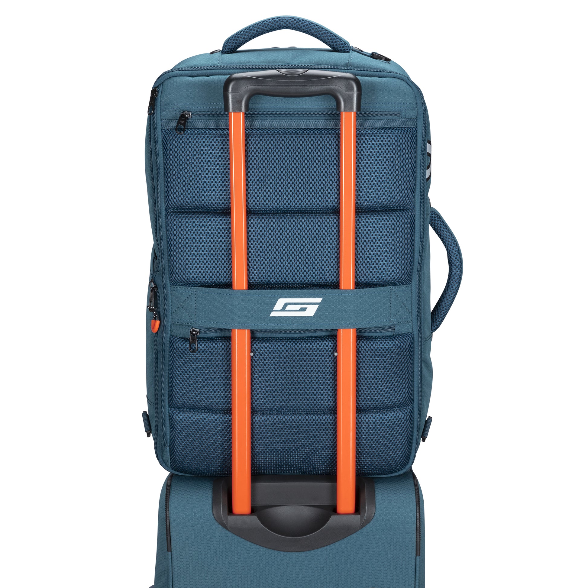 Graphite Metamorph Convertible Travel Backpack by Graphite with laptop compartment, stacked on a suitcase.
