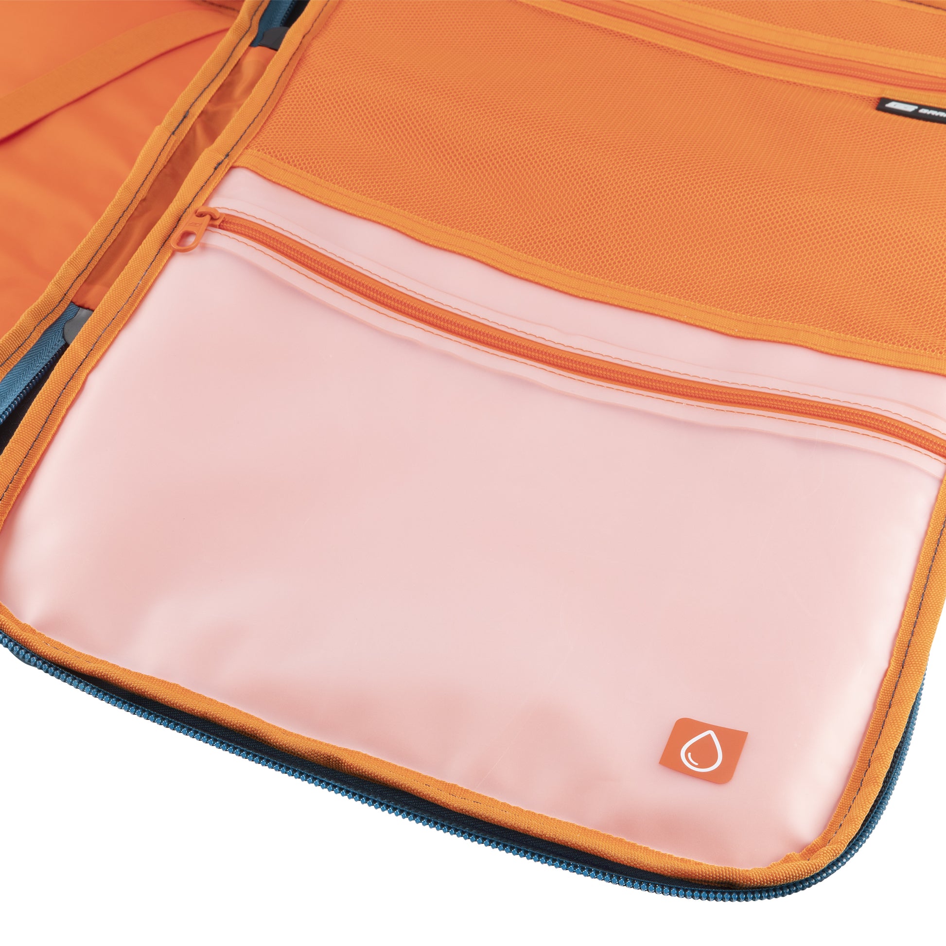 Open orange and pink pouch with mesh pocket for Graphite Metamorph Convertible Travel Backpack, viewed from above.