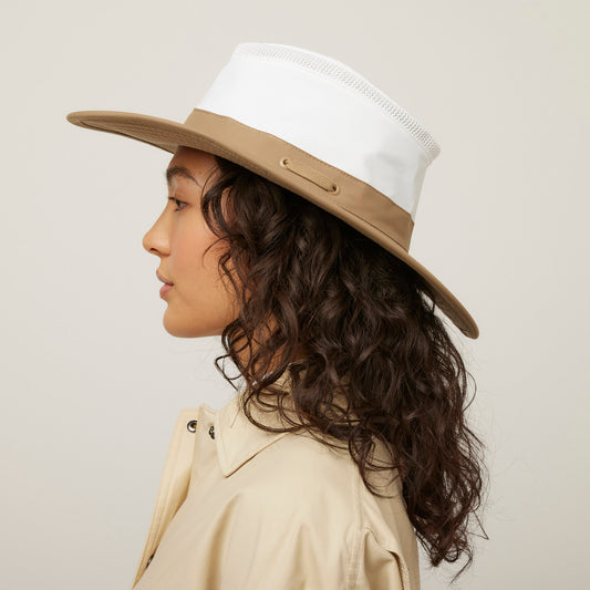 Product Image – Person in Tilley LTM6 Airflo® Contrast Broad Brim Hat, shown in profile against a plain background.
