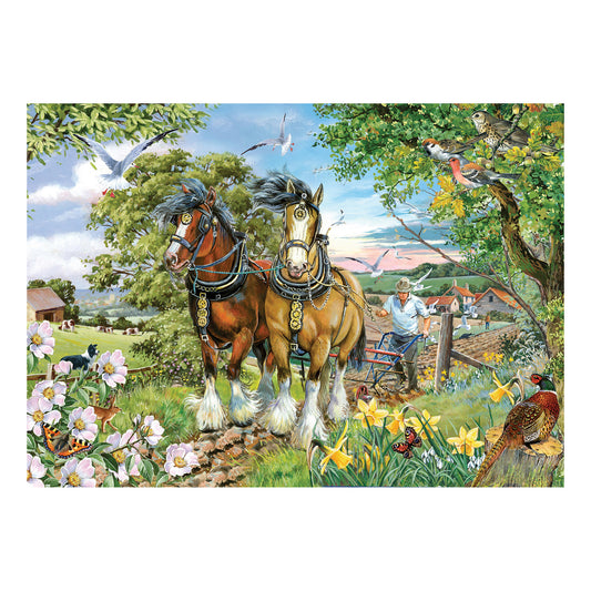 Product Image – House of Puzzles 150 Piece Mini Jigsaw Puzzle Tube - Strength & Beauty shows horses and a farmer in a flower field.